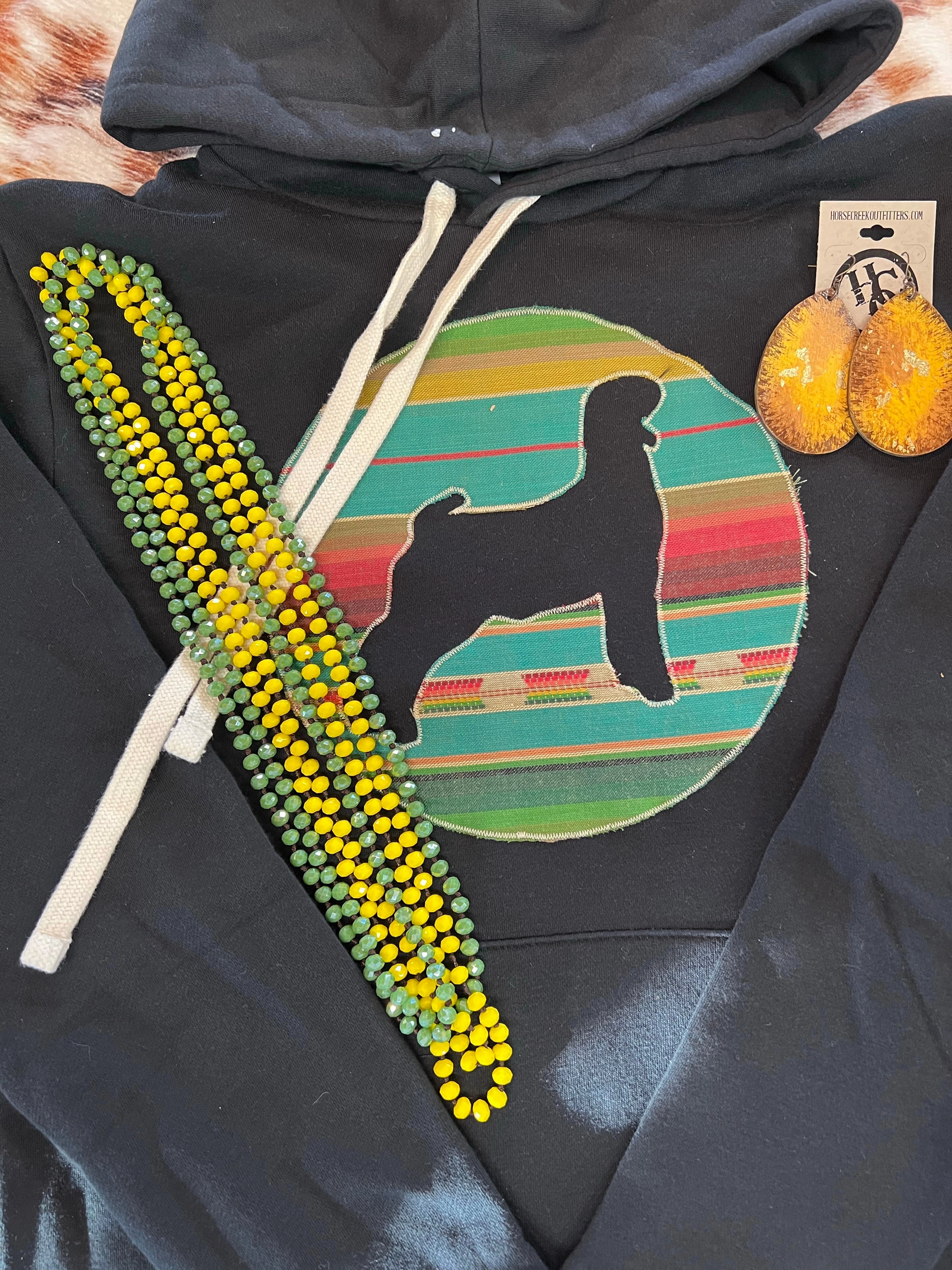 All-Season Comfort Black Sweatshirt with Serape Goat